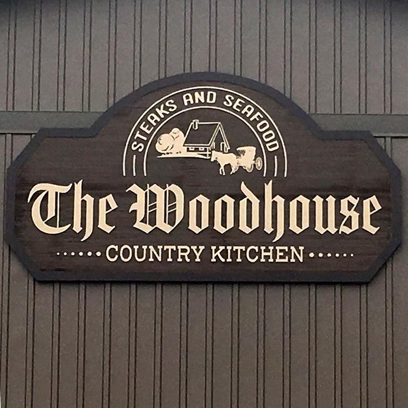 The Woodhouse Restaurant-Grabill IN - Logo